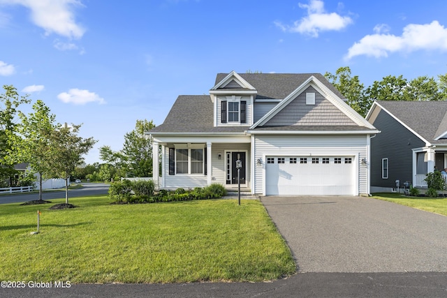 2 Hillard Ln, Colonie, NY 12110 - view of front of house with an attached garage, driveway, and a front yard