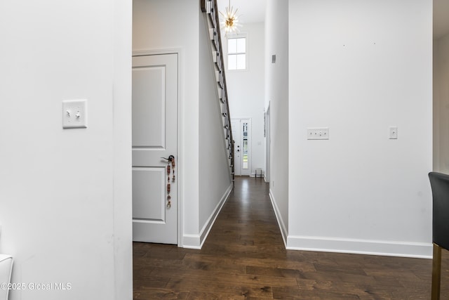 2 Hillard Ln, Colonie, NY 12110 - hallway with dark wood-style floors, stairs, and baseboards