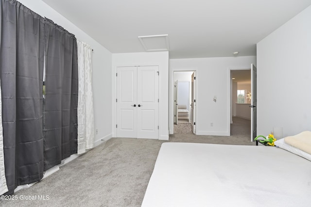 2 Hillard Ln, Colonie, NY 12110 - bedroom with attic access, carpet flooring, baseboards, and a closet