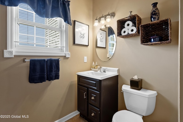 3119 State Route 150, Schodack, NY 12063 - bathroom with vanity, toilet, and baseboards