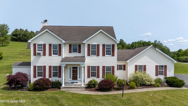 3119 State Route 150, Schodack, NY 12063 - view of front of house featuring a chimney, a front lawn, and roof with shingles