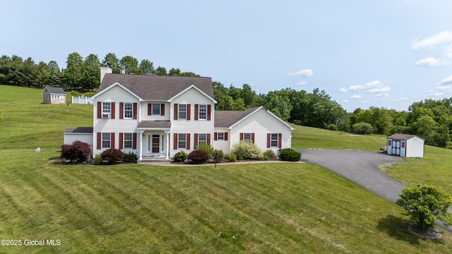 3119 State Route 150, Schodack, NY 12063 - view of front facade with a front yard and a chimney