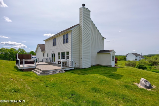 3119 State Route 150, Schodack, NY 12063 - back of property featuring a yard, a deck, and a chimney