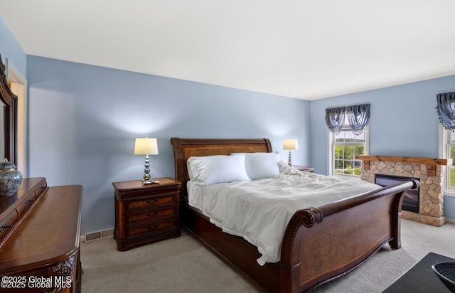 3119 State Route 150, Schodack, NY 12063 - carpeted bedroom with baseboards and a fireplace