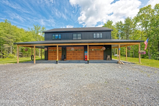 17 Ringwald Rd, Coeymans, NY 12046 - farmhouse inspired home with board and batten siding, a garage, driveway, and an outdoor structure