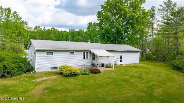 149 Wilton Rd, Greenfield, NY 12833 - rear view of house with a lawn, entry steps, a patio area, and a wooded view