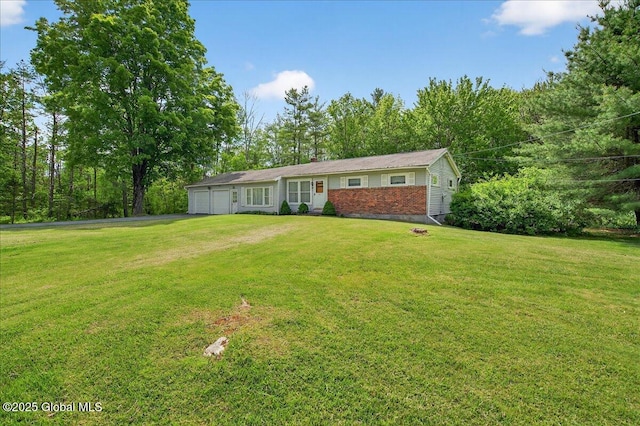 149 Wilton Rd, Greenfield, NY 12833 - ranch-style house featuring an attached garage, a front lawn, and asphalt driveway