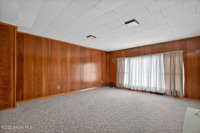 149 Wilton Rd, Greenfield, NY 12833 - empty room with wooden walls and carpet floors