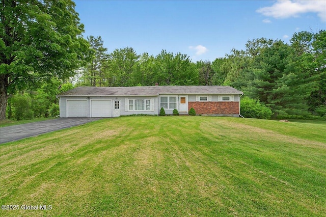 149 Wilton Rd, Greenfield, NY 12833 - ranch-style house with a garage, asphalt driveway, a front lawn, and brick siding