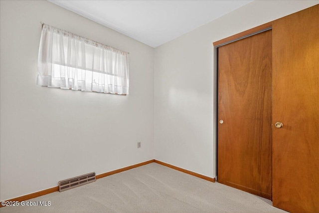 149 Wilton Rd, Greenfield, NY 12833 - unfurnished bedroom featuring baseboards, carpet, and a closet