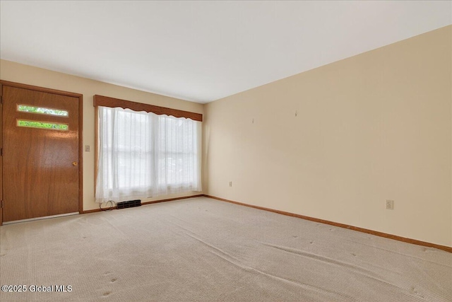 149 Wilton Rd, Greenfield, NY 12833 - foyer featuring baseboards and light colored carpet