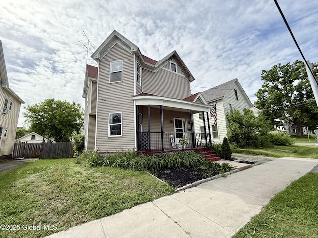 243 N Perry St, Johnstown, NY 12095 - view of front of property with a porch
