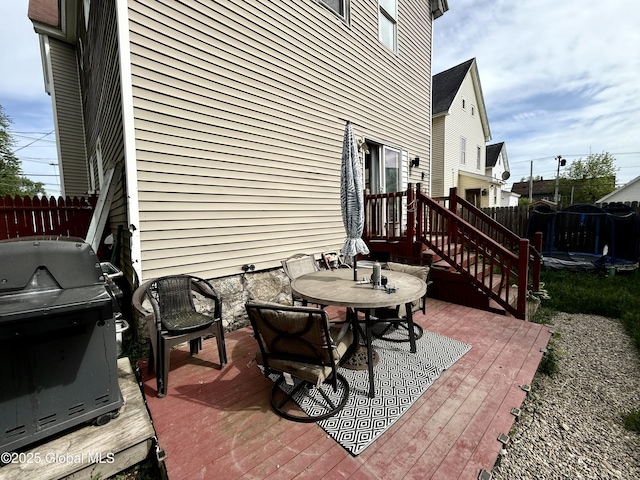 243 N Perry St, Johnstown, NY 12095 - view of patio / terrace featuring a deck, outdoor dining area, and a grill