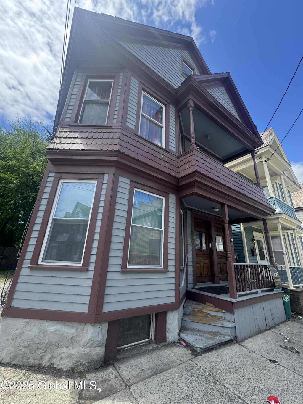 13 Ingersoll Ave, Schenectady, NY 12305 - victorian-style house with a porch and a balcony