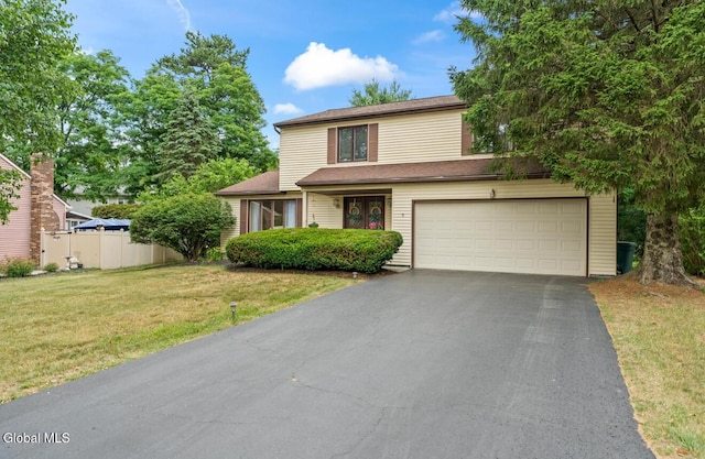 7 Hawthorn Cir, Albany, NY 12203 - traditional-style home with asphalt driveway and an attached garage