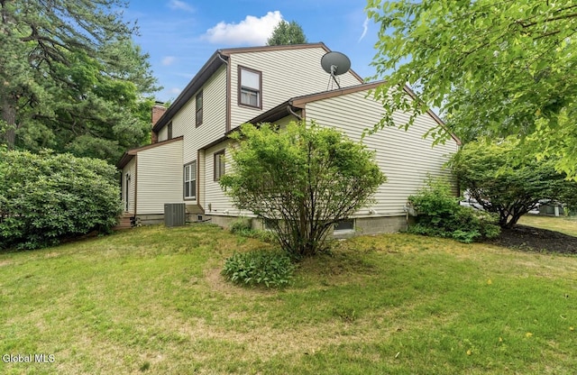 7 Hawthorn Cir, Albany, NY 12203 - view of property exterior with a lawn, entry steps, and a chimney