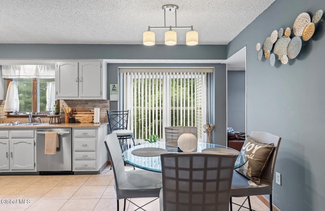 7 Hawthorn Cir, Albany, NY 12203 - dining space with a textured ceiling and light tile patterned flooring