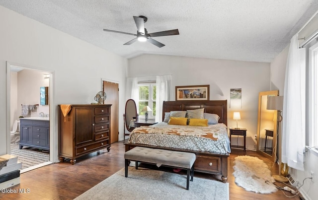7 Hawthorn Cir, Albany, NY 12203 - bedroom with lofted ceiling, dark wood finished floors, a textured ceiling, connected bathroom, and ceiling fan