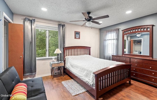 7 Hawthorn Cir, Albany, NY 12203 - bedroom featuring wood finished floors, a textured ceiling, recessed lighting, and ceiling fan