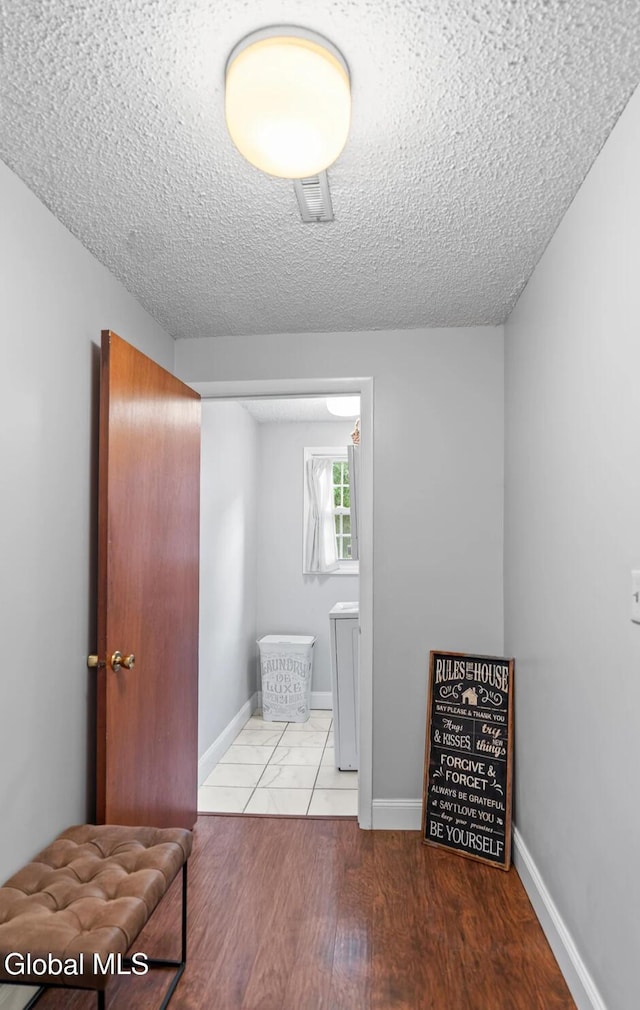 7 Hawthorn Cir, Albany, NY 12203 - unfurnished bedroom featuring a textured ceiling and wood finished floors
