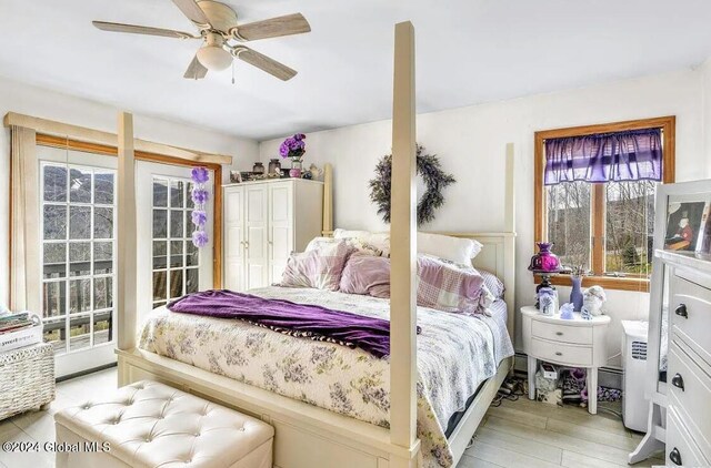 167 Botti Dr, Hunter, NY 12442 - bedroom featuring light wood finished floors, access to exterior, and a ceiling fan