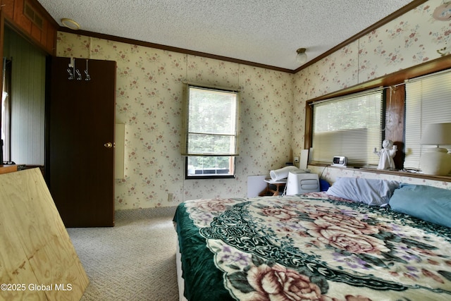 202 Lakeland Rd, Edinburg, NY 12835 - carpeted bedroom with crown molding, a textured ceiling, and wallpapered walls