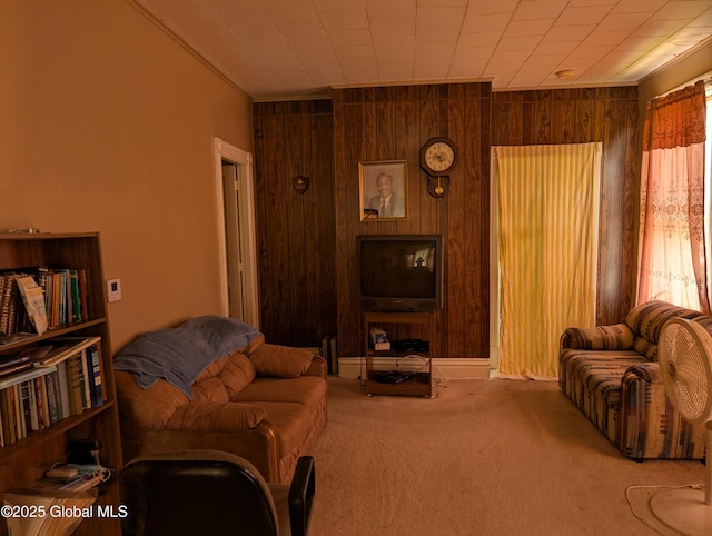 6 123rd St, Troy, NY 12182 - living area with wooden walls, carpet, and crown molding