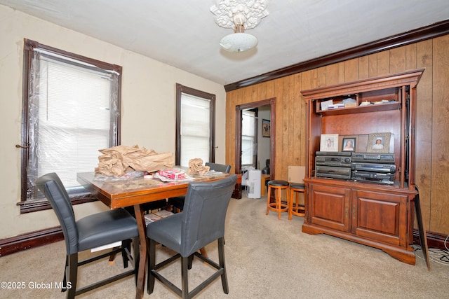 6 123rd St, Troy, NY 12182 - dining area featuring light colored carpet and wooden walls