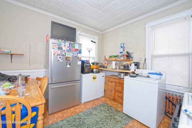 6 123rd St, Troy, NY 12182 - kitchen with freestanding refrigerator, washer / clothes dryer, crown molding, an ornate ceiling, and refrigerator