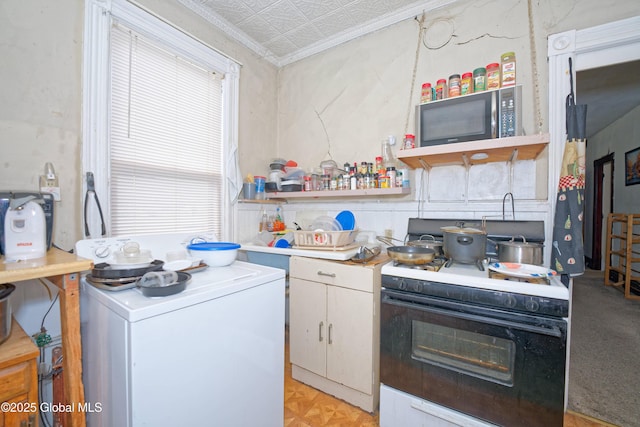 6 123rd St, Troy, NY 12182 - kitchen with washer / clothes dryer, stove, an ornate ceiling, stainless steel microwave, and open shelves