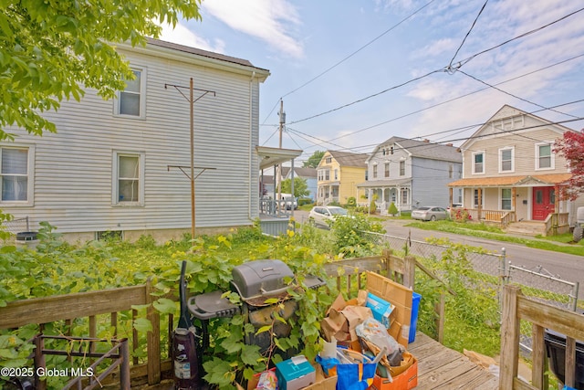 6 123rd St, Troy, NY 12182 - wooden terrace featuring a residential view and a grill