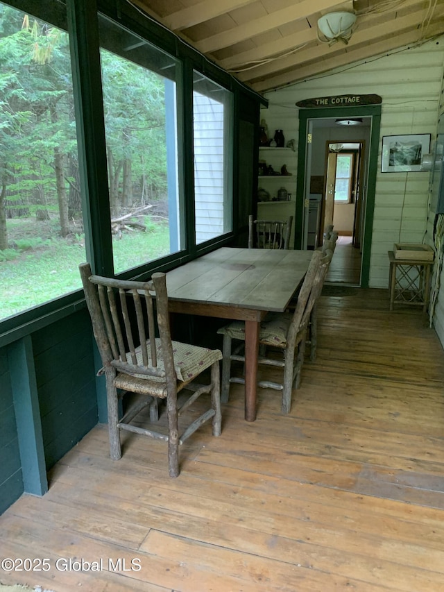847 Lake Ave, Lake Luzerne, NY 12846 - dining space featuring lofted ceiling and hardwood / wood-style flooring