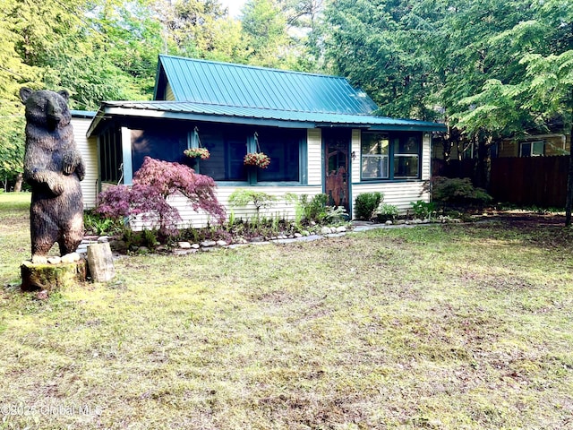 847 Lake Ave, Lake Luzerne, NY 12846 - view of front of home with a metal roof