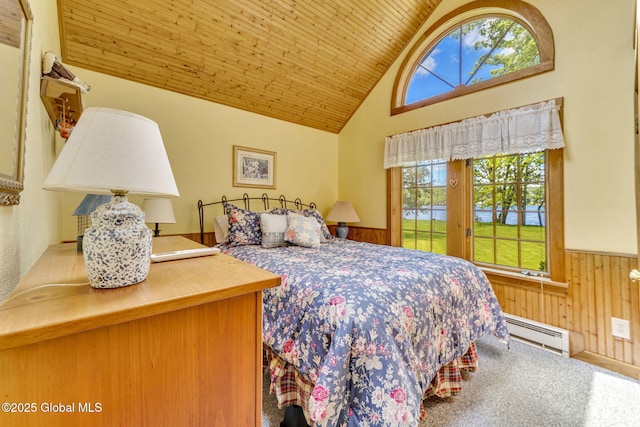 2555 County Highway 22, Exeter, NY 13315 - bedroom with baseboard heating, multiple windows, wainscoting, wooden walls, and wood ceiling