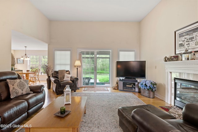 6 Rose Ct, Malta, NY 12019 - living room with wood finished floors and a premium fireplace