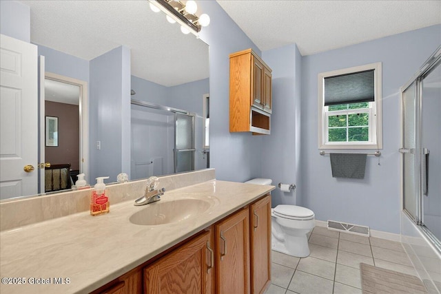 41A Raylinsky Ln, Halfmoon, NY 12118 - full bath with vanity, tile patterned floors, a textured ceiling, and shower / bath combination with glass door