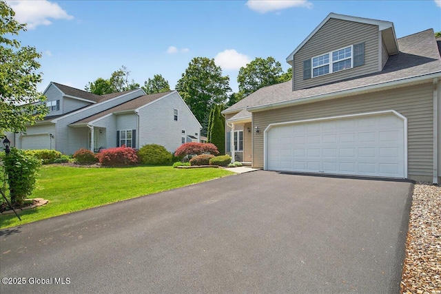 41A Raylinsky Ln, Halfmoon, NY 12118 - traditional-style house featuring asphalt driveway and a front yard