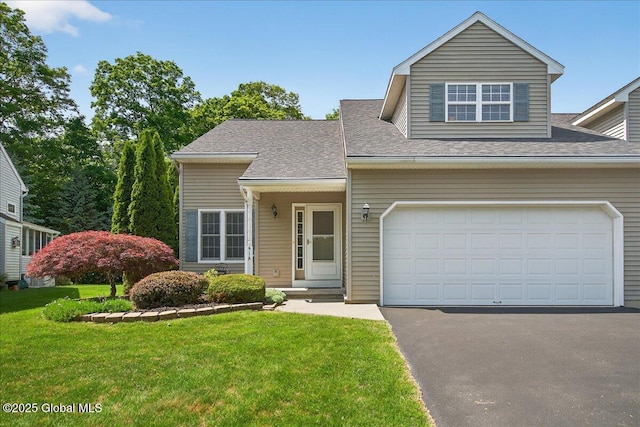 41A Raylinsky Ln, Halfmoon, NY 12118 - view of front facade featuring driveway, a front yard, and a shingled roof