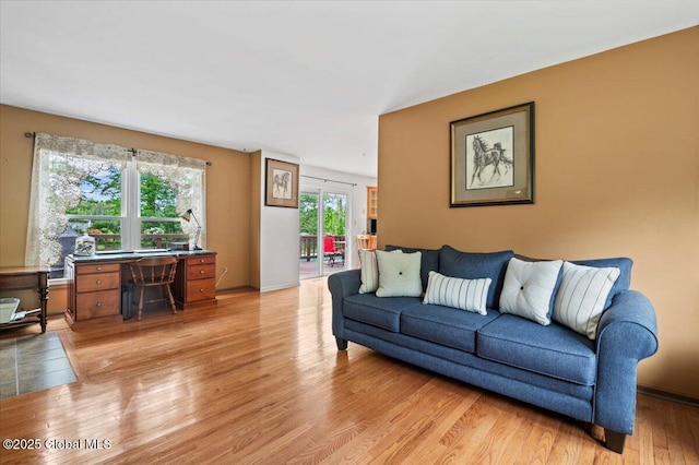 15 Iris Ave, Moreau, NY 12803 - living room with a desk and light wood-style flooring