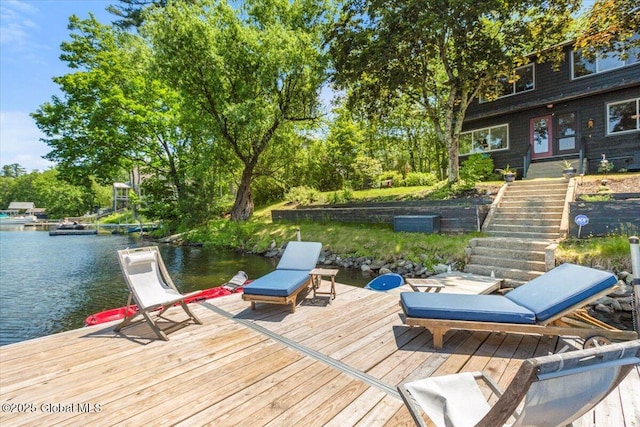 162 Methodist Farm Rd, Sand Lake, NY 12018 - wooden deck with a water view, a boat dock, stairway, and view of wooded area