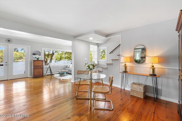 162 Methodist Farm Rd, Sand Lake, NY 12018 - dining space with stairs and hardwood / wood-style floors