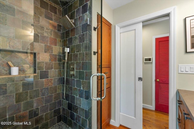 162 Methodist Farm Rd, Sand Lake, NY 12018 - bathroom with a shower stall, vanity, and wood finished floors