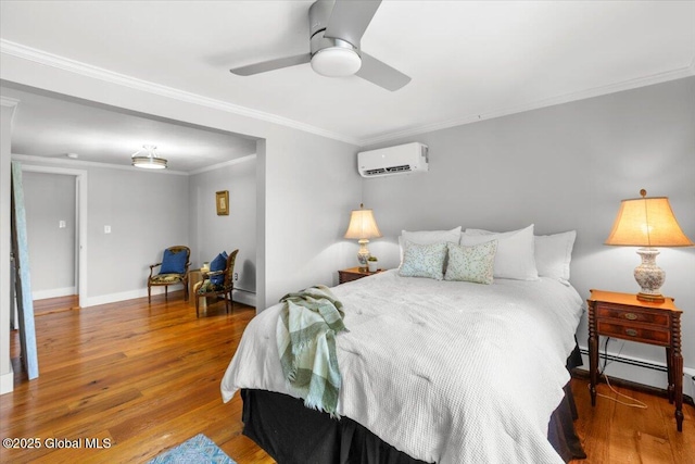 162 Methodist Farm Rd, Sand Lake, NY 12018 - bedroom featuring an AC wall unit, a baseboard heating unit, wood finished floors, ornamental molding, and a ceiling fan