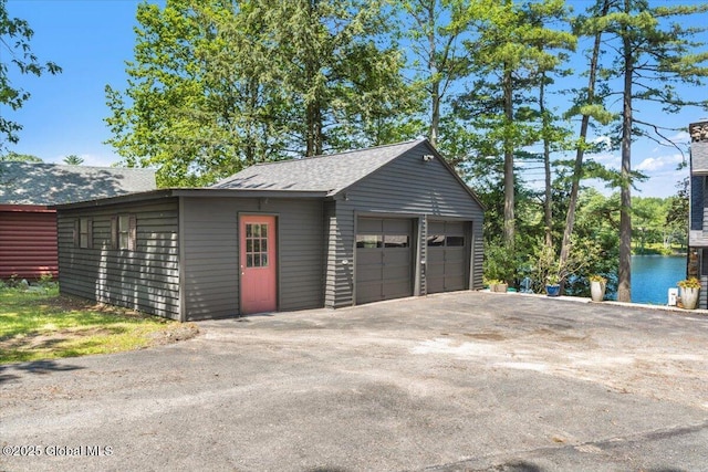 162 Methodist Farm Rd, Sand Lake, NY 12018 - detached garage with a water view