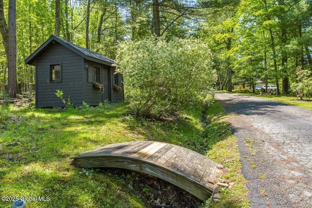 162 Methodist Farm Rd, Sand Lake, NY 12018 - view of front of house featuring an outbuilding and driveway