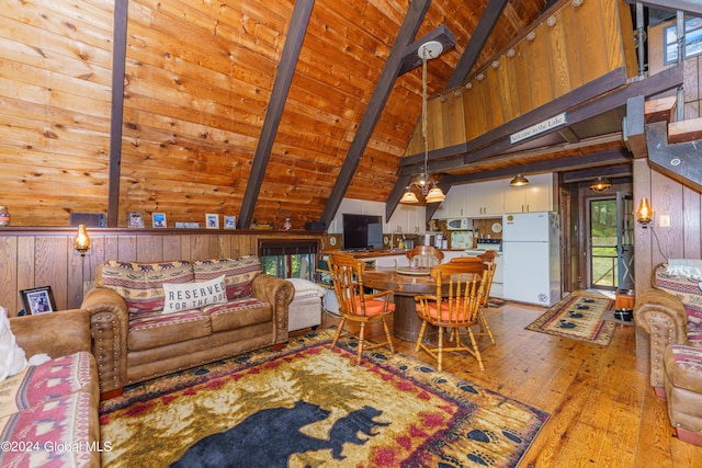 17 Oak Cir, Day, NY 12835 - living room featuring wood-type flooring, wooden ceiling, wooden walls, and healthy amount of natural light