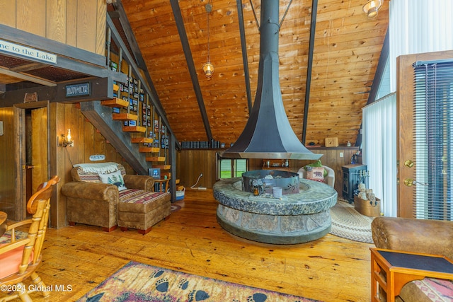 17 Oak Cir, Day, NY 12835 - living area with hardwood / wood-style flooring, wood ceiling, wooden walls, and stairs