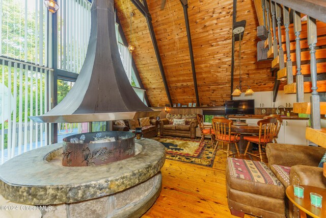17 Oak Cir, Day, NY 12835 - living area with wood-type flooring, plenty of natural light, and wooden ceiling