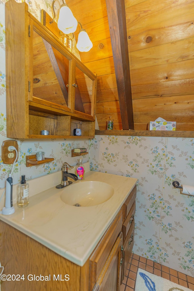 17 Oak Cir, Day, NY 12835 - bathroom with vanity, tile patterned floors, and a wood ceiling with exposed beams