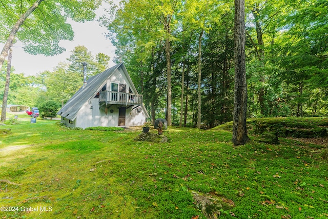 17 Oak Cir, Day, NY 12835 - view of side of home featuring a yard and a deck